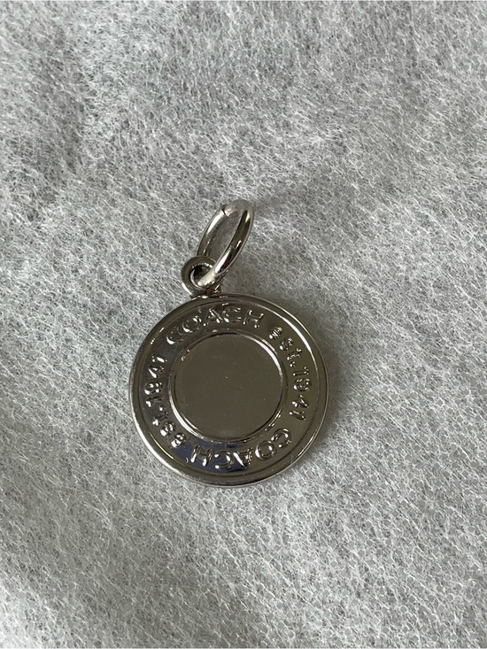 Coach Accessories - Coach 2009 EUC round metallic logo charm/hangtag No chain